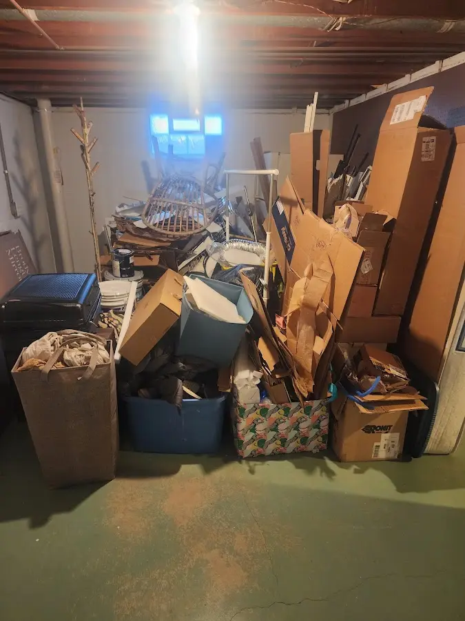 Roll-off dumpster container at job site for 40 Yard Dumpster Rental in Alpena